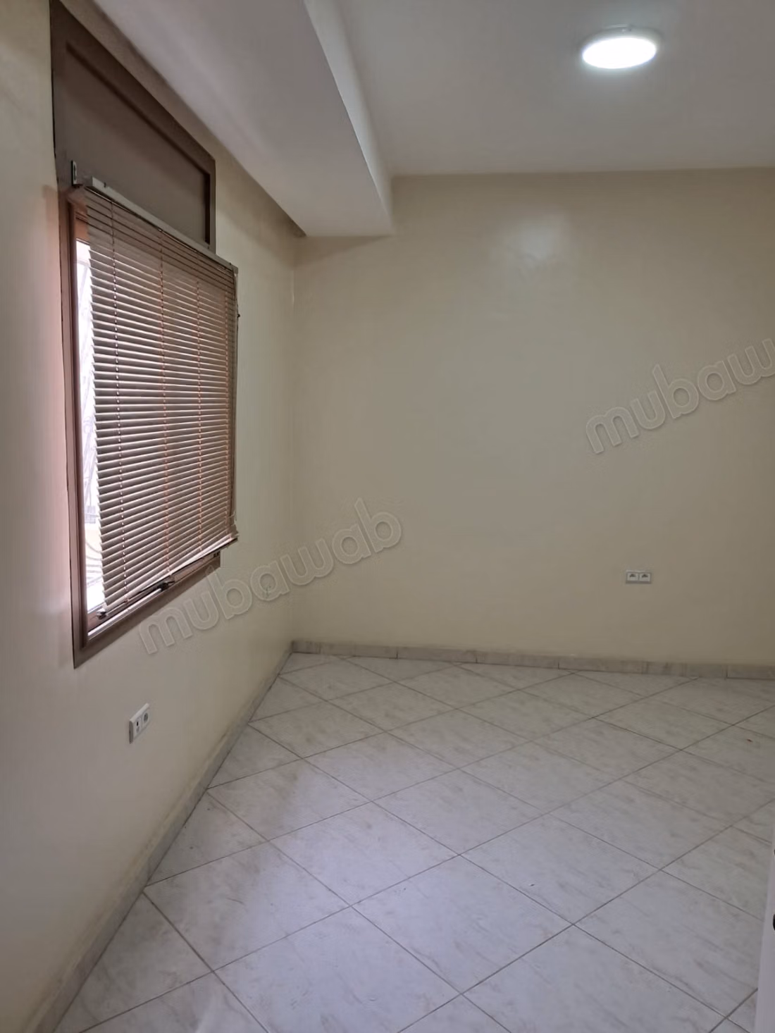 Appartement à HAJ FATEH 
usage professionnel 100m²