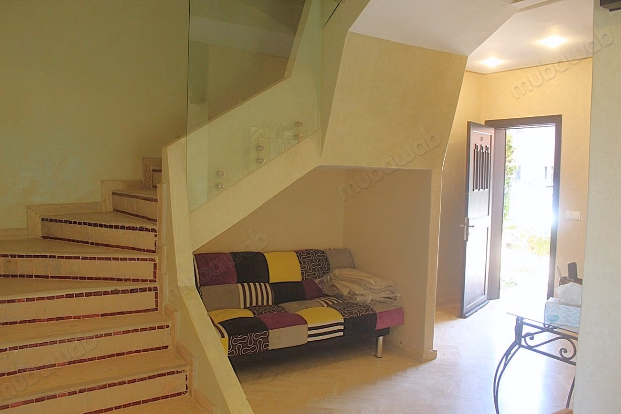 Duplex avec jardin dans un domaine avec piscine
