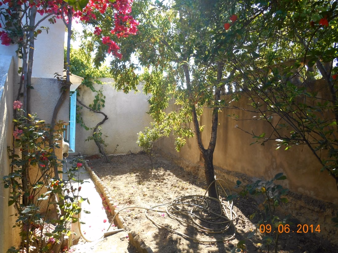 Maison avec jardin à vendre