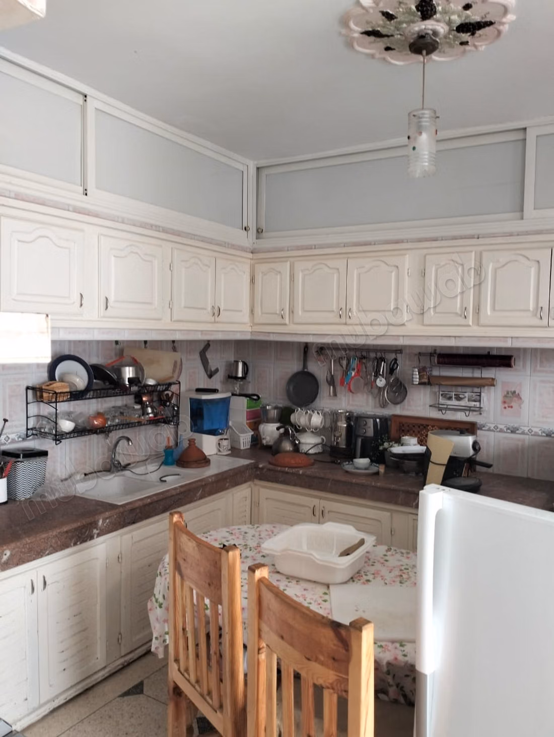 House for sale in Khouribga. Area of 99 m². Parking spaces and beautiful garden