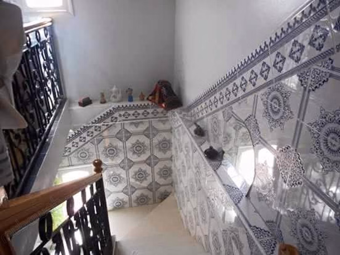 House for sale in Khouribga. Area of 99 m². Parking spaces and beautiful garden