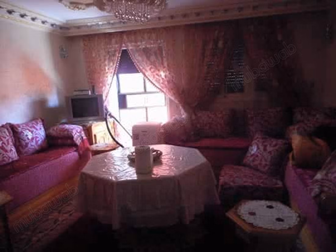 House for sale in Khouribga. Area of 99 m². Parking spaces and beautiful garden