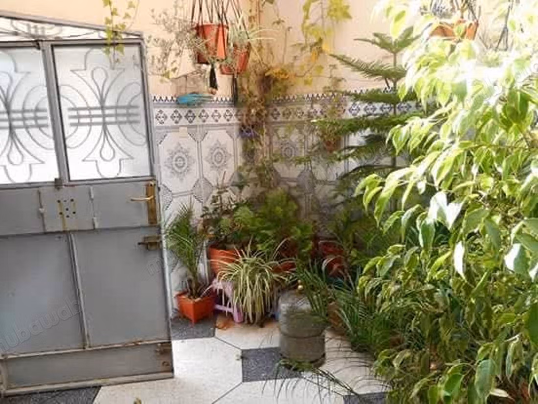 House for sale in Khouribga. Area of 99 m². Parking spaces and beautiful garden