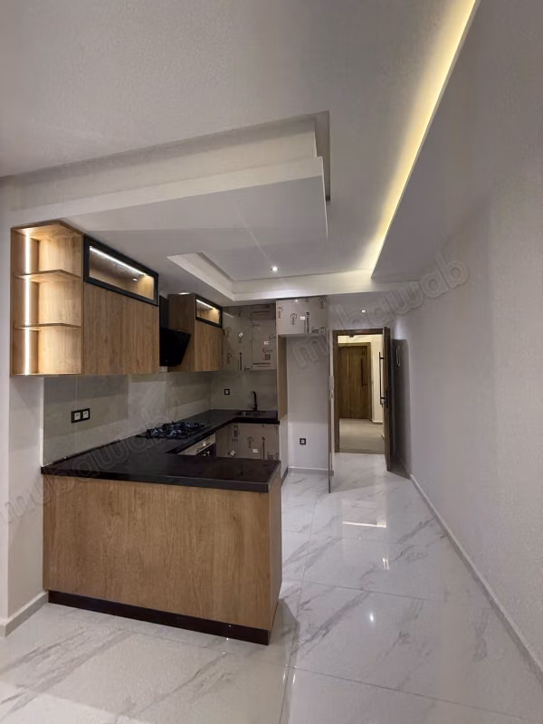 Appartement magnifique à vendre à Martil. Superficie totale de 66 m². Immeuble avec portier, et climatisation