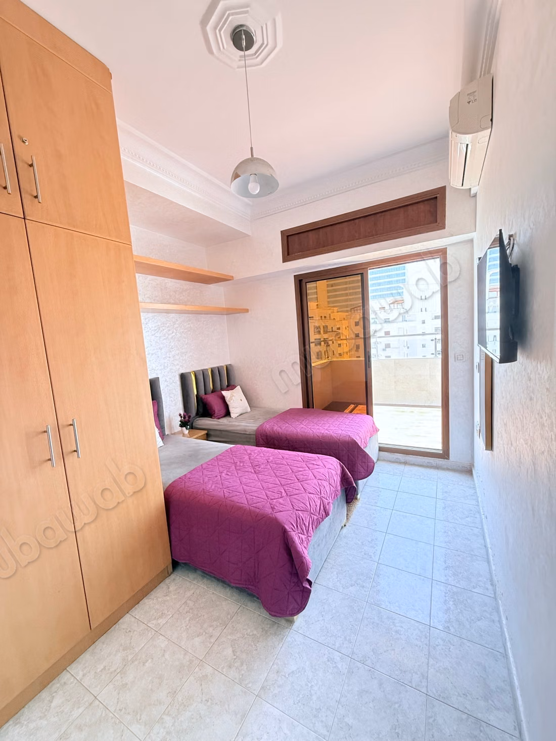 Seizoensverhuur in Tanger City Center. 2 comfortabele kamers. Terras en lift