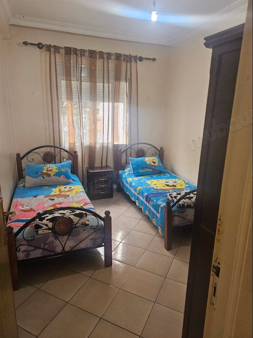 Vakantieappartement te huur in Hay Salam. 4 grote kamers. Versterkte deur, traditionele Marokkaanse woonkamer