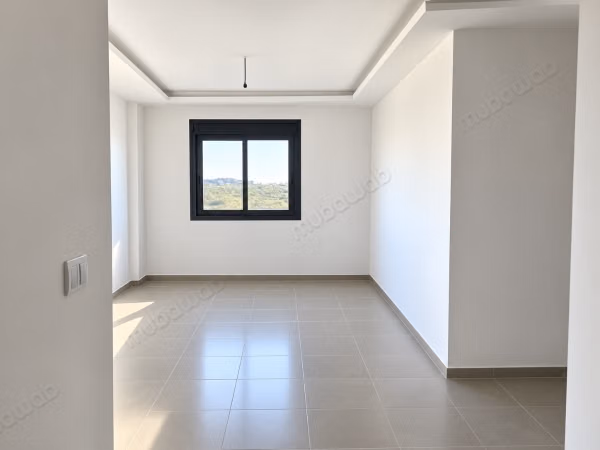 Vente d'un bel appartement à Boukhalef. 2 chambres agréables. Cuisine équipée