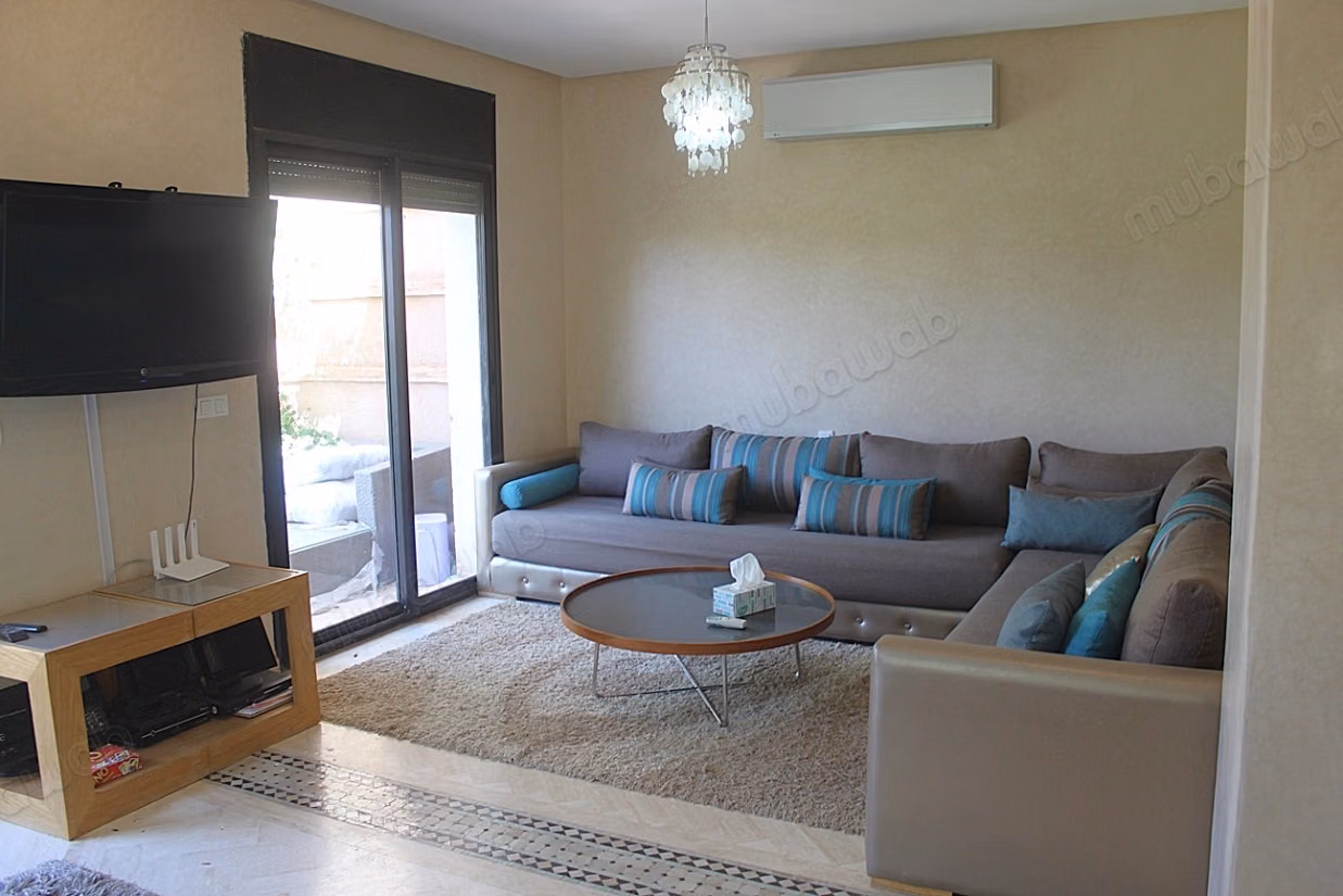 Duplex avec jardin dans un domaine avec piscine