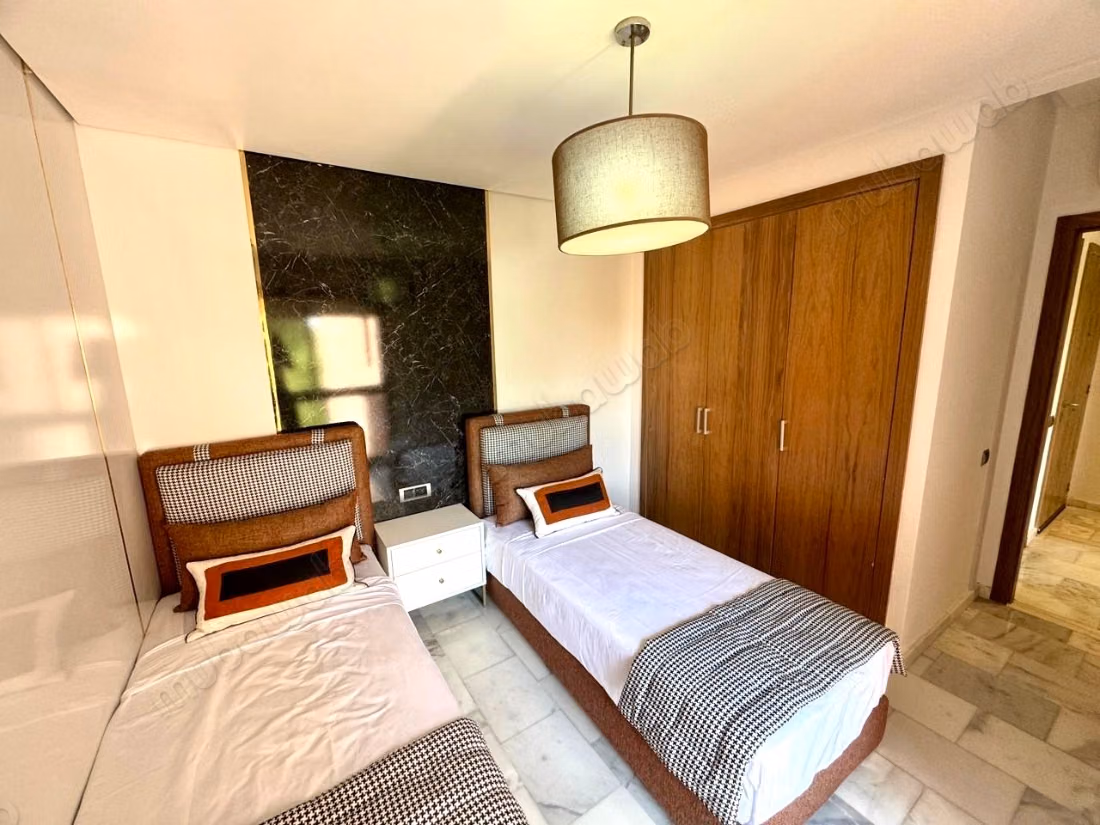 In Affitto Arredato: Magnifico Appartamento con 2 Camere Senza Affacci nel Cuore del Golf di Prestigia a Marrakech
