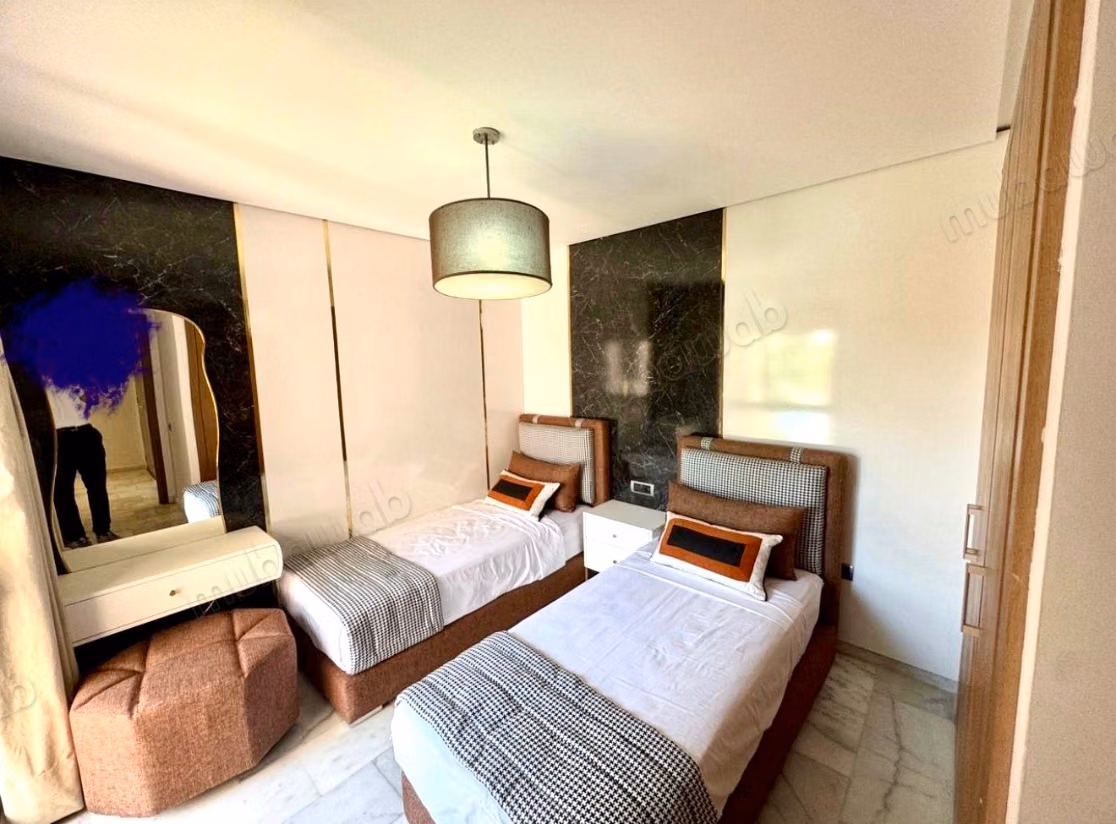 In Affitto Arredato: Magnifico Appartamento con 2 Camere Senza Affacci nel Cuore del Golf di Prestigia a Marrakech