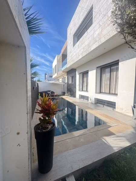 Villa moderna con piscina orientada al sur en venta en Harhoura