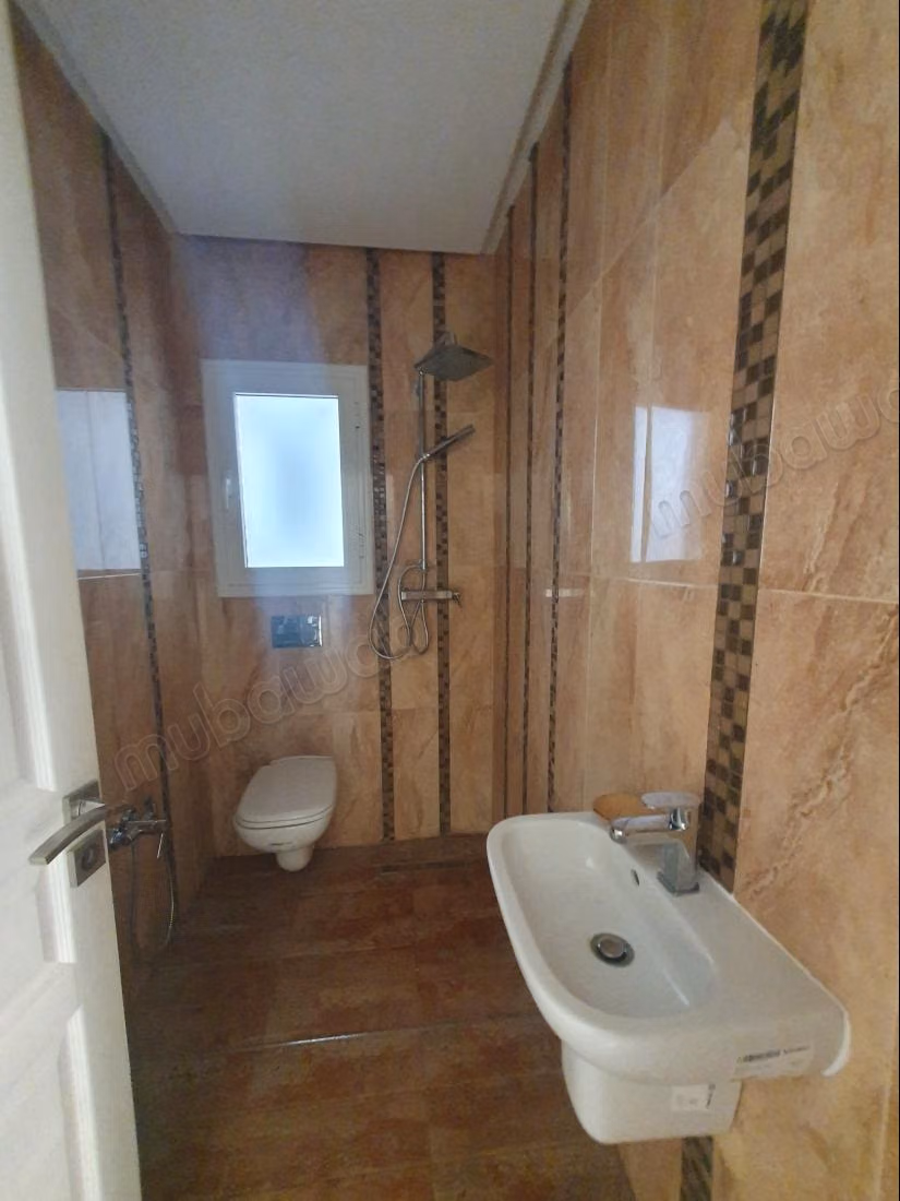 An empty S3 apartment in La Marsa