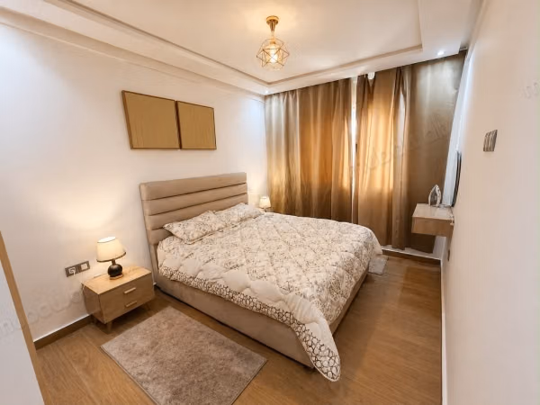 New apartment, never lived in, located on the third floor of a modern residence (less than five years old) with an elevator. The building is situated directly on a main thoroughfare in the heart of Rabat, offering a strategic location that facilitates access to various neighborhoods and services.