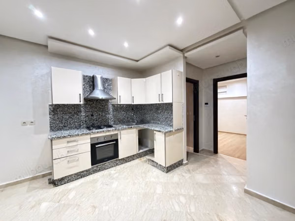 Location jolie appartement vide à Rez de chaussée. 65 mètre