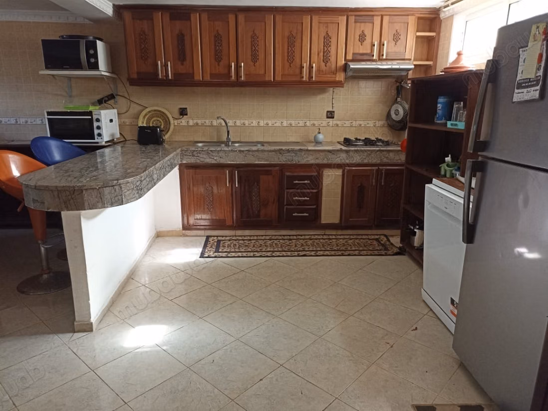 High-end house for sale in Harhoura. Area 123 m². Reinforced door, Moroccan lounge