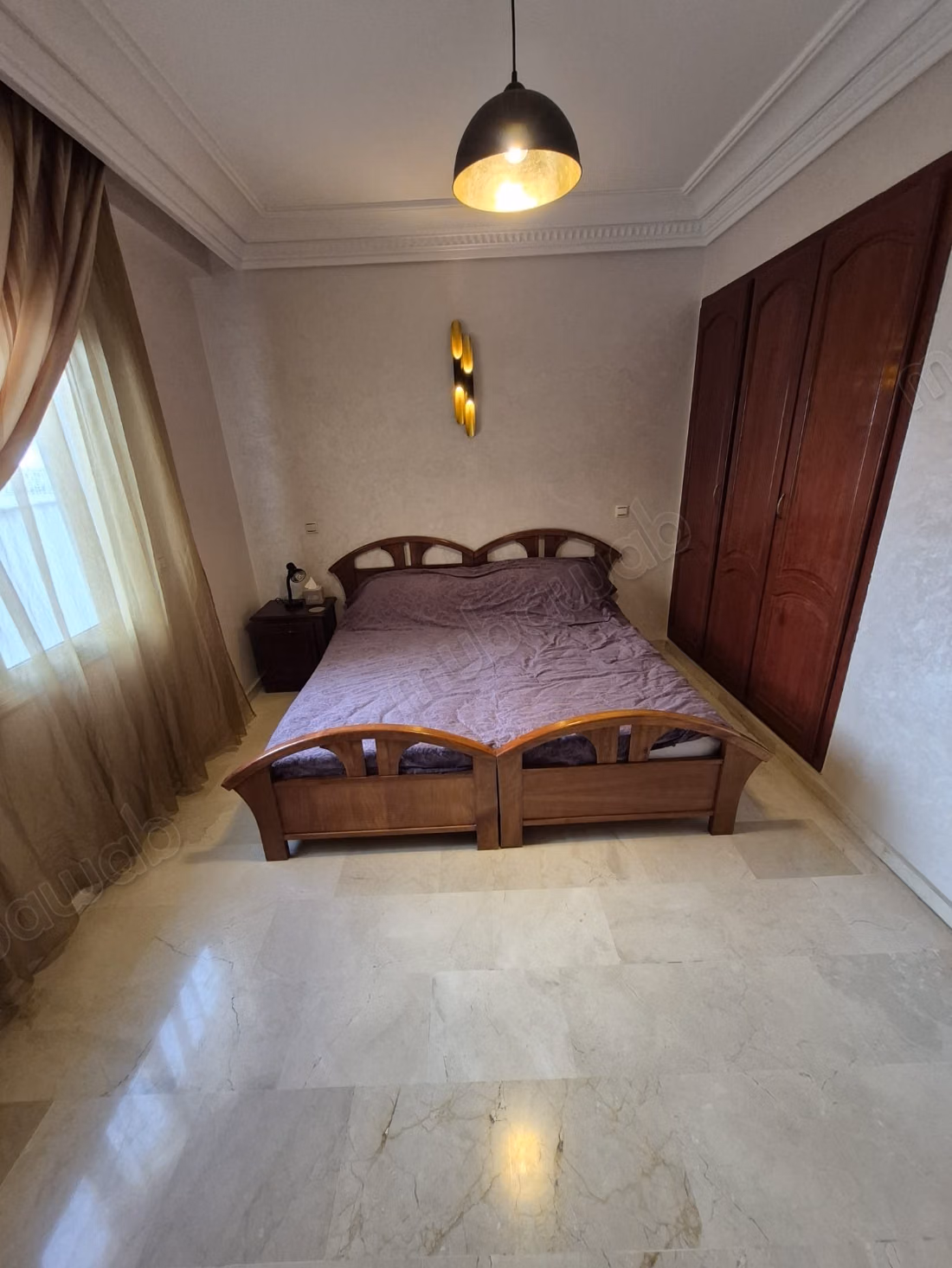 Te koop appartement in Gauthier. 3 mooie slaapkamers. Open haard en conciërgeservice