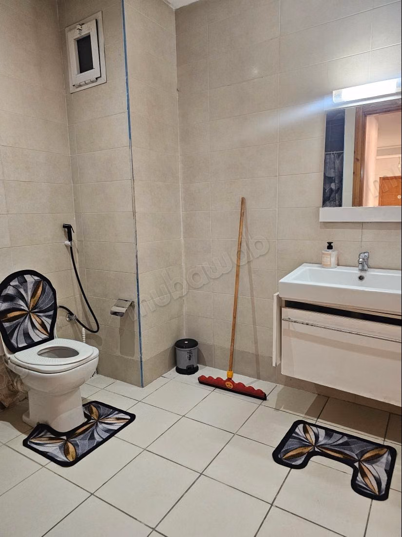 Rent this apartment in Mimosas. 2 bedrooms. Traditional Moroccan living room, secure residence
