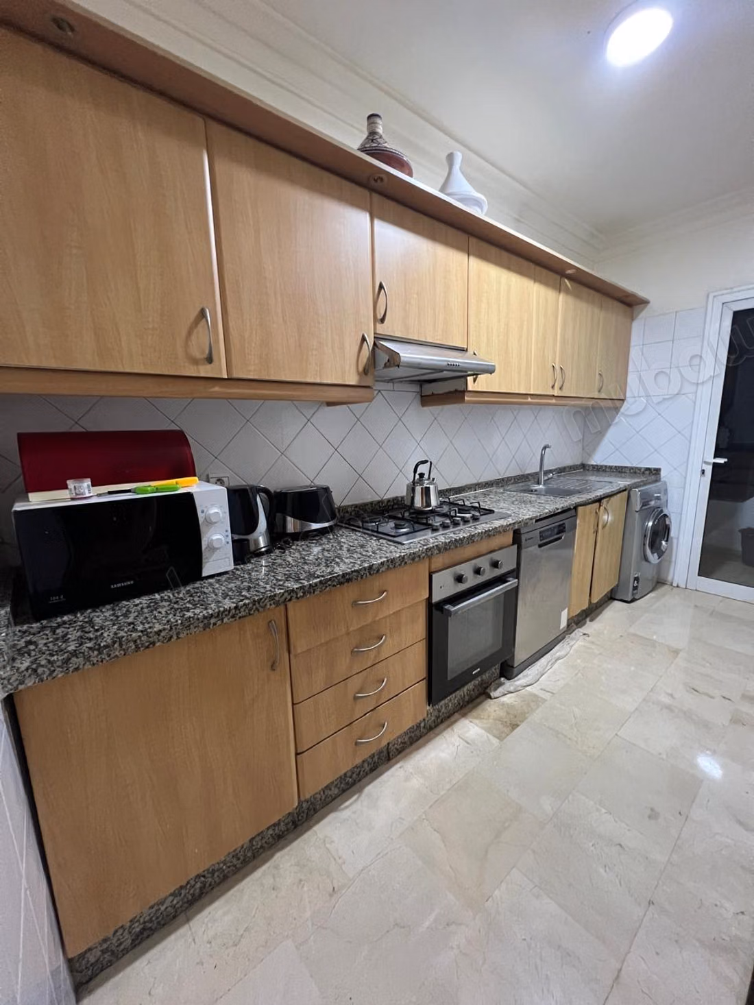 Appartement à louer à Racine. 
Surface de 90 m². 
Bien meublé