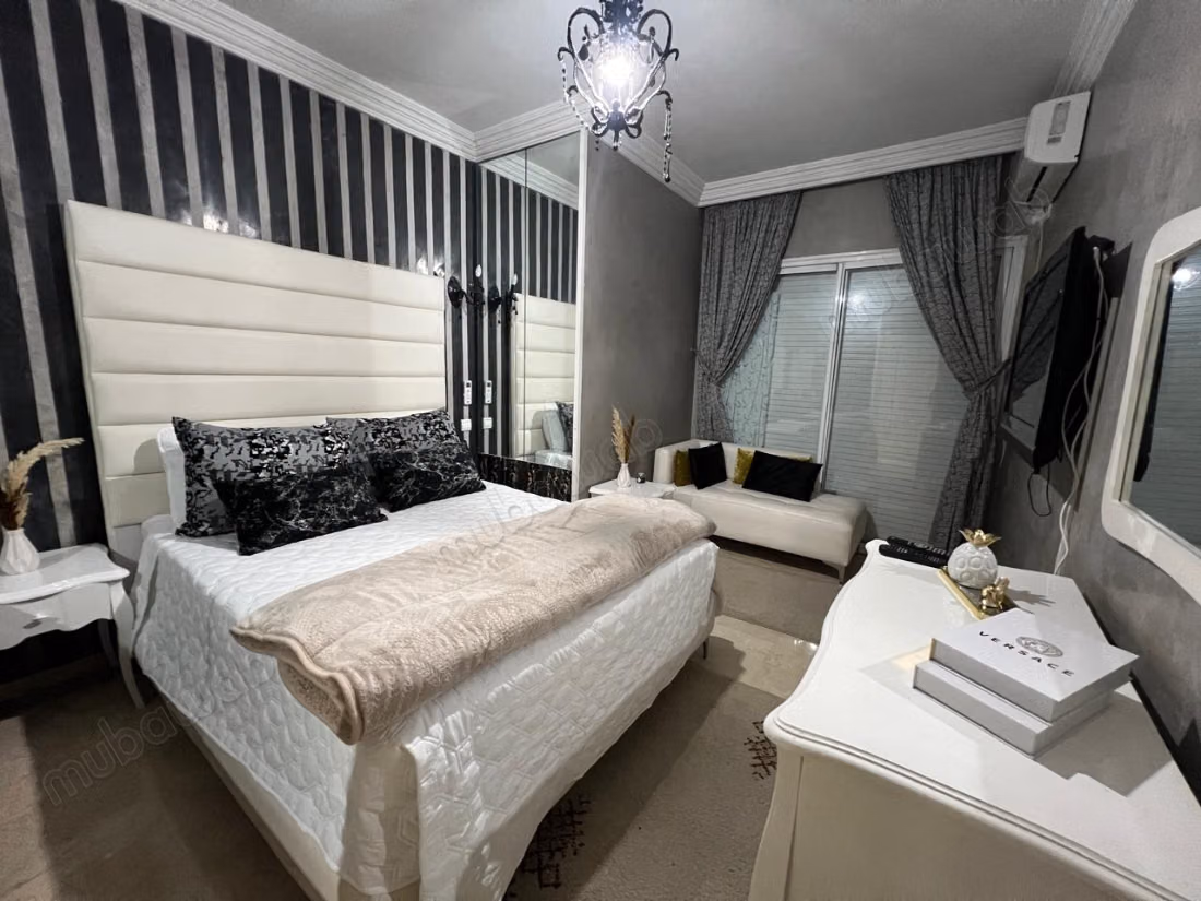 Appartement à louer à Racine. 
Surface de 90 m². 
Bien meublé