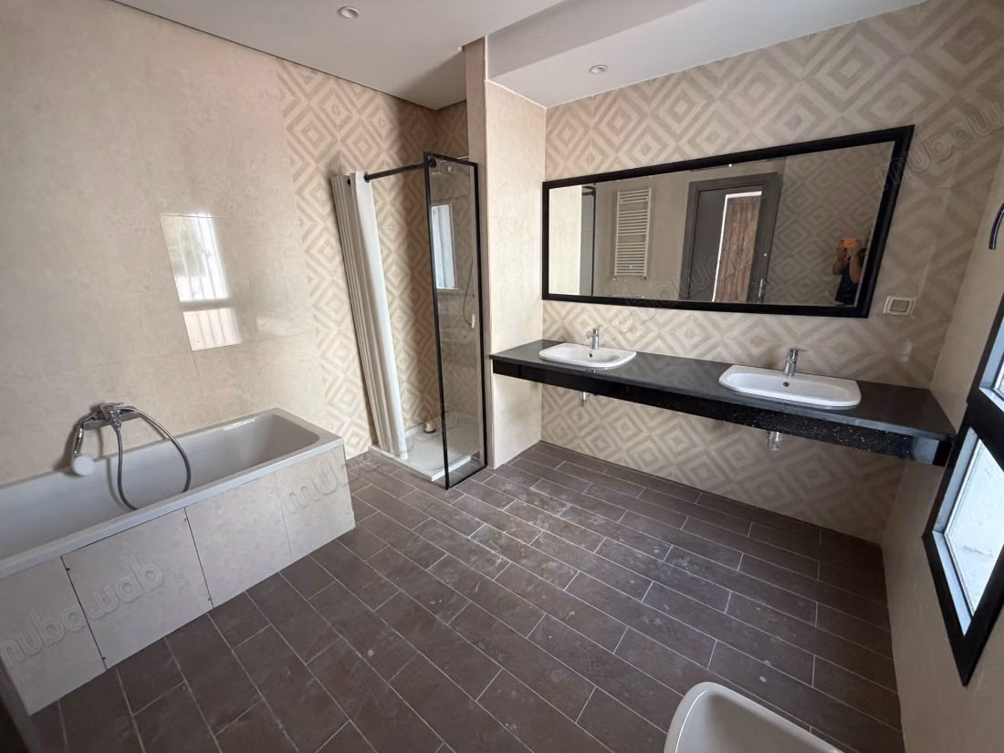  Nord hilton, un magnifique appartement s3 au rez de chaussée avec jardin