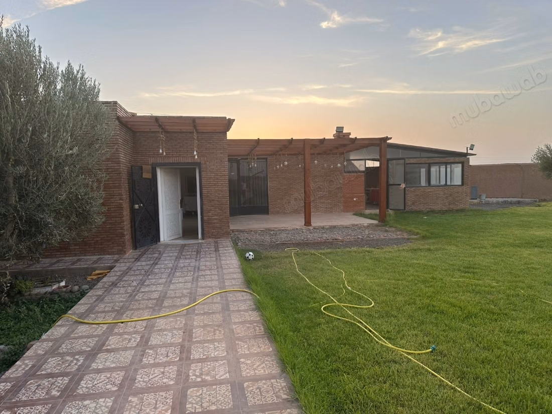 A vendre ferme 1 Ha 
Route Ourika