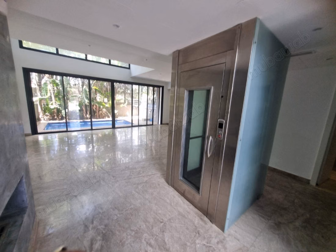  La soukra – triplex jumelé avec ascenseur privatif & piscine à vendre
