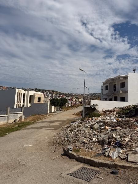 Land in Tanja Balia. Twin villa with 3 facades