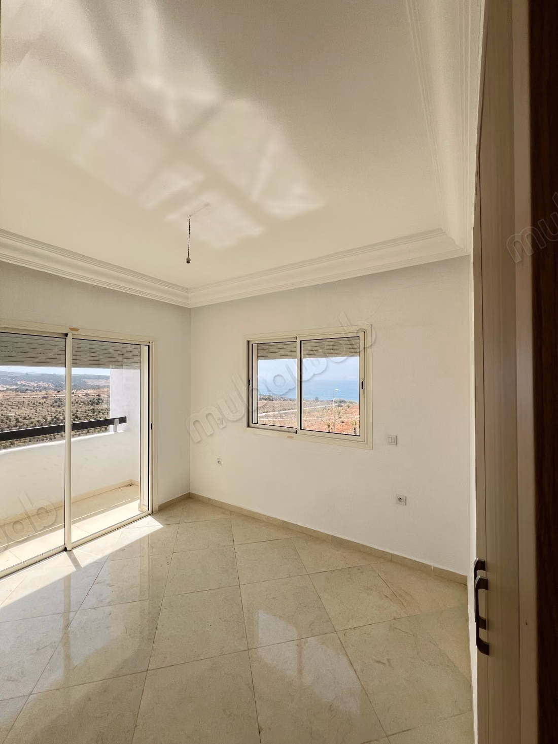 Apartment for sale in Asilah. Area 65 m². Quiet environment with sea view, central heating