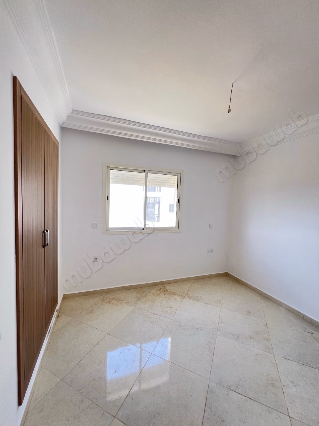 Apartment for sale in Asilah. Area 65 m². Quiet environment with sea view, central heating