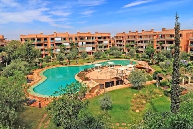 Affitto di un appartamento arredato con una camera da letto al piano terra con piscina comune ad Agdal Marrakech