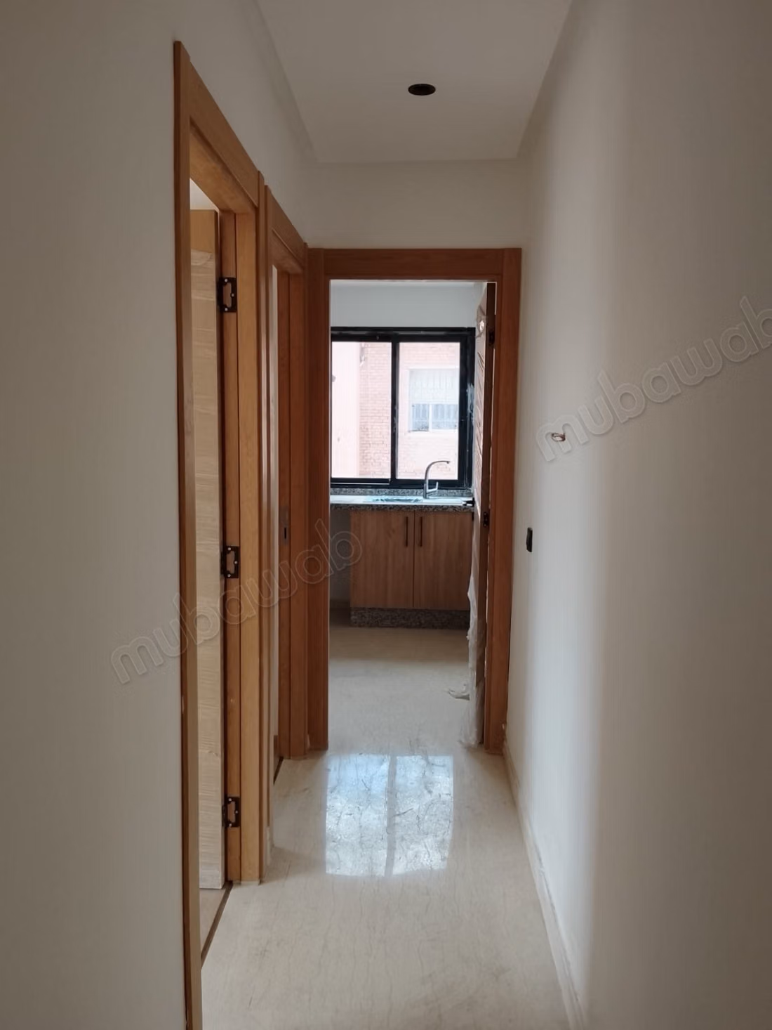 New apartment 56 m² – Medium standing – titled parking