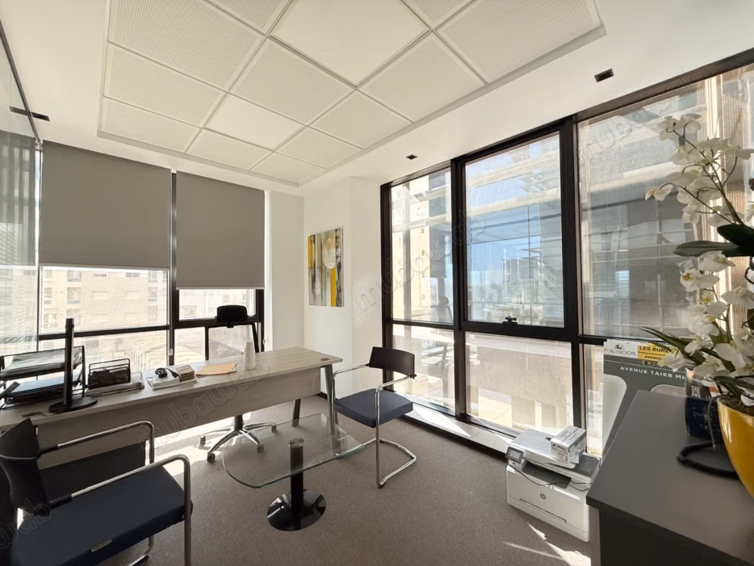 Office rental at Les Berges Du Lac 2. Total area 237 m². Central heating and armored door.