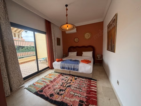 Louez cet appartement à Samlalia. 2 chambres. Service de concierge disponible, climatisation générale