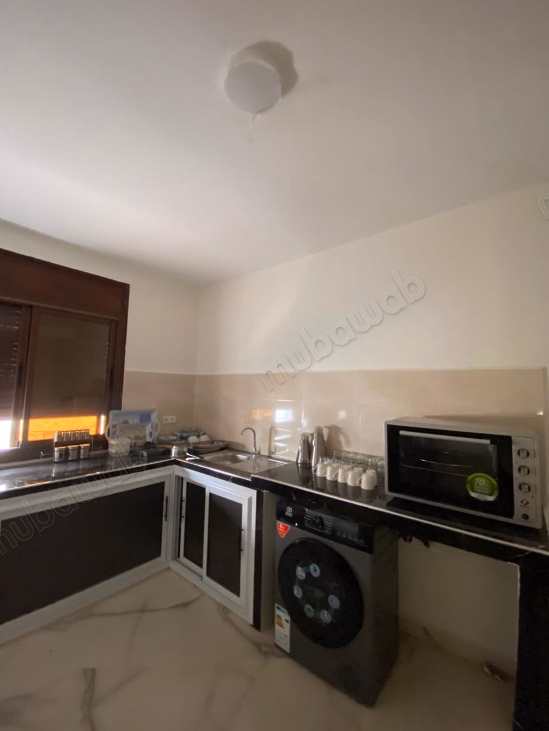 Bel appartement à louer à Al Nahda. Superficie totale 120 m². Meublé