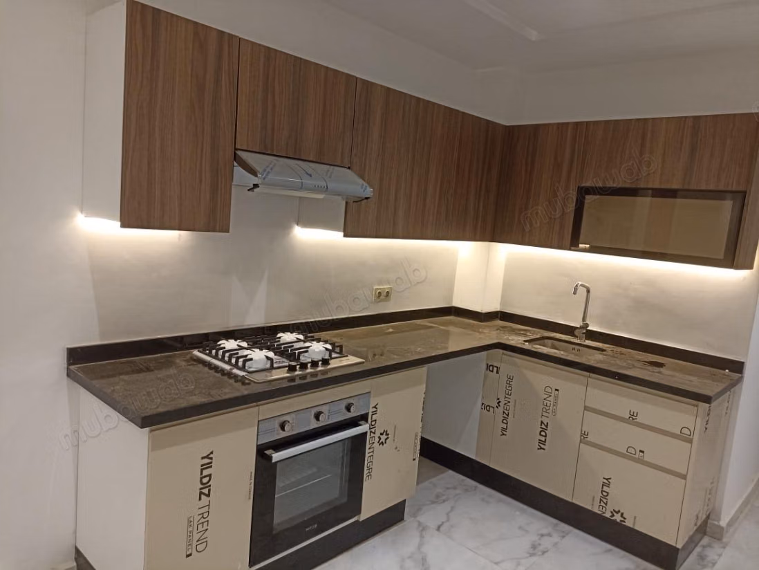 À vendre : Appartement à Asilah. 2 grandes pièces. Avec ascenseur et espace vert