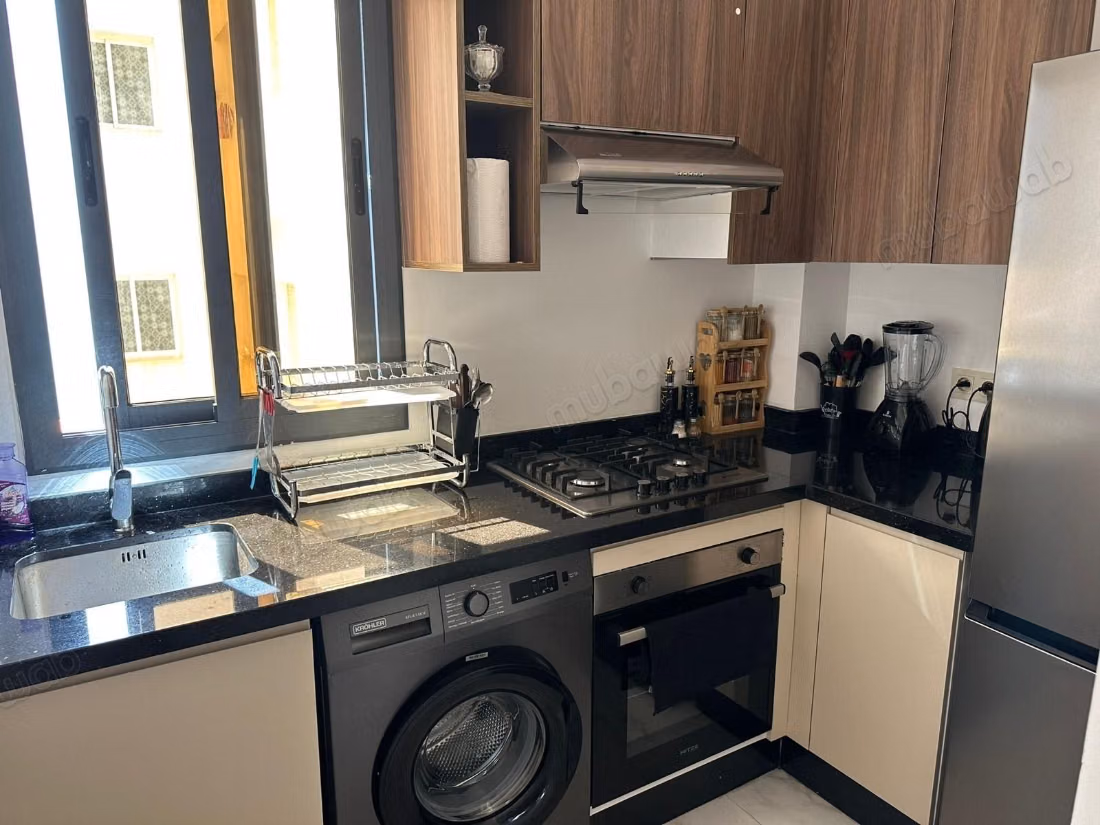 À vendre : Appartement à Asilah. 2 grandes pièces. Avec ascenseur et espace vert