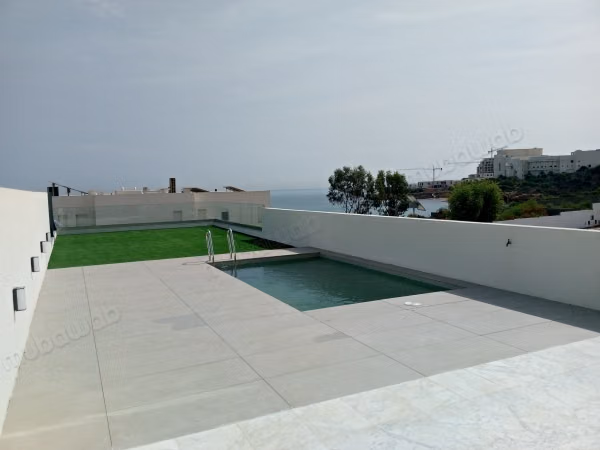 Triplex S4 with pool and sea view
