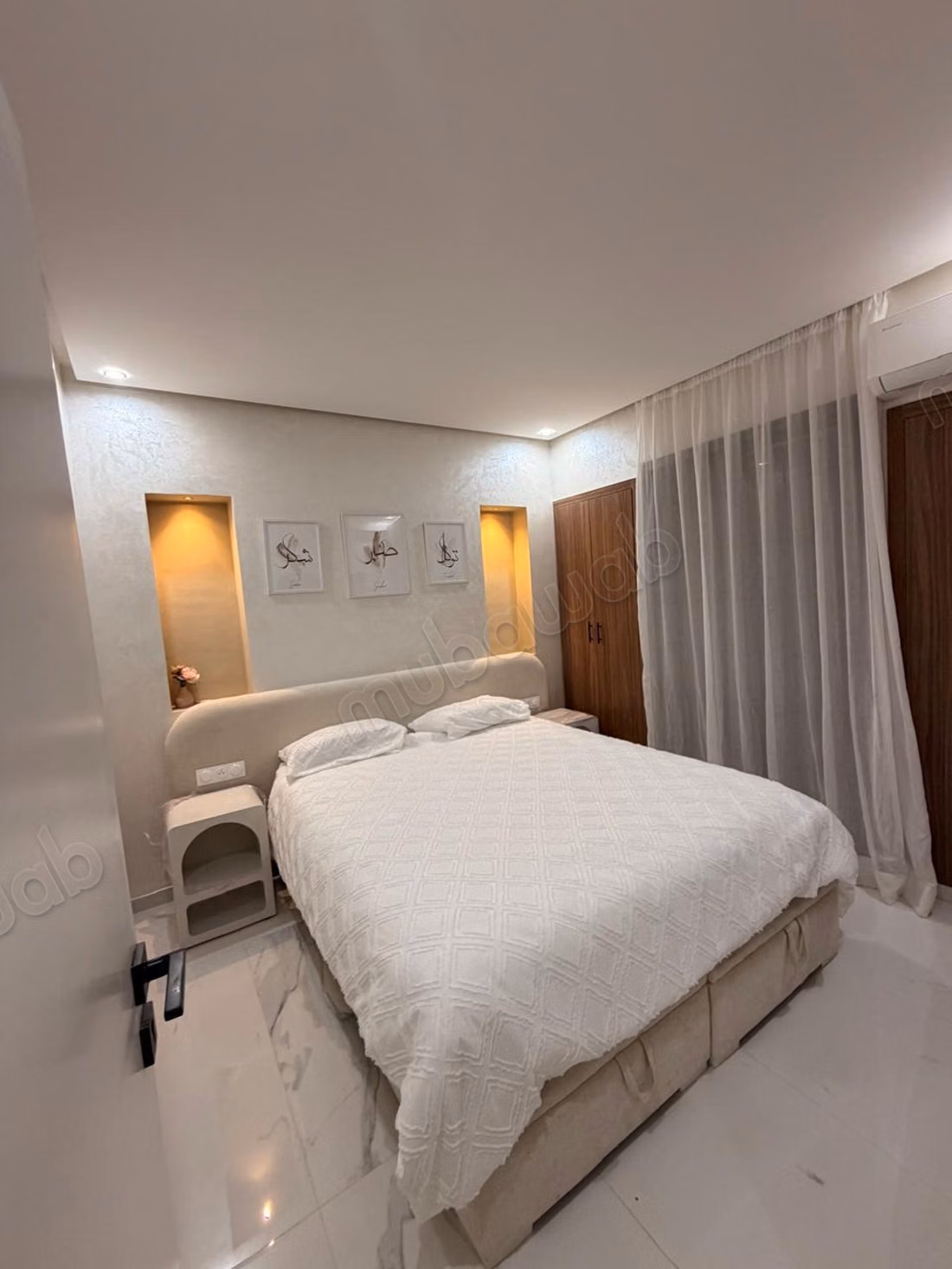 Appartement 2 chambres et salonen rez de jardin dans résidence vu atlas
