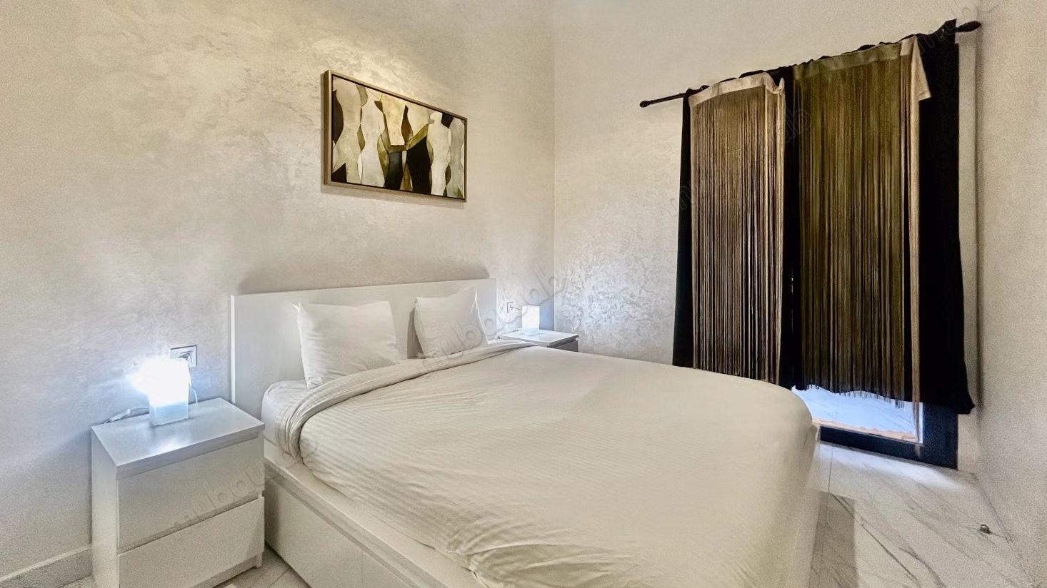 Appartement en rez de jardin avec piscine à vendre