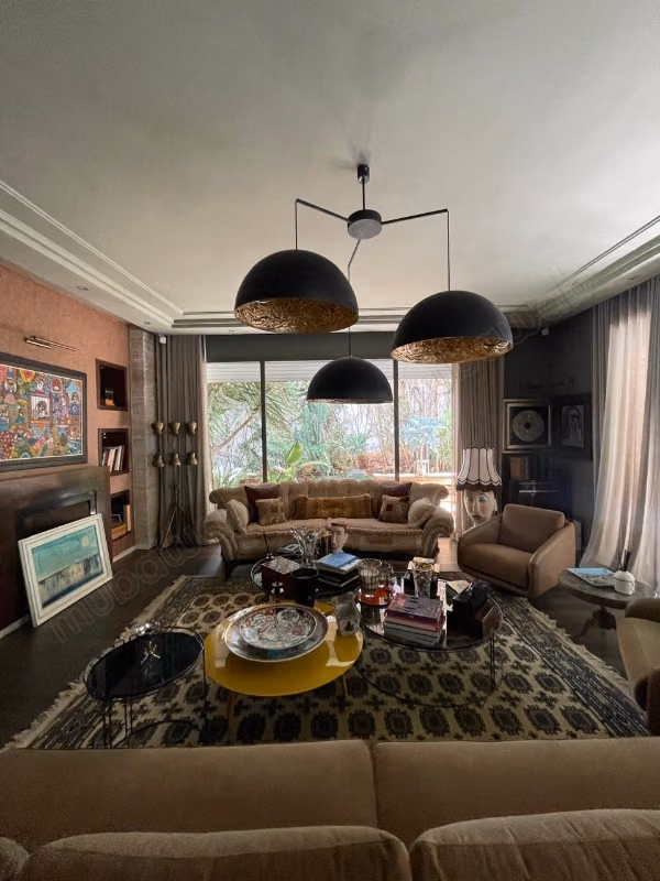 Espléndida villa en venta en la Extensión de Ain Diab. Superficie 450 m². Aire acondicionado y piscina
