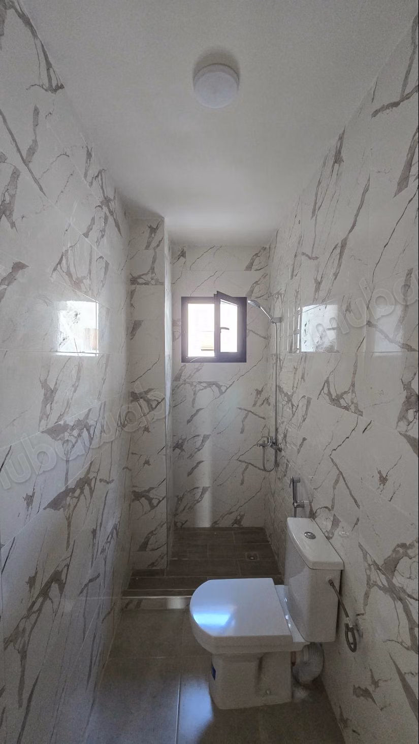 Apartamento en venta en Martil. 2 hermosas habitaciones. Jardín y terraza