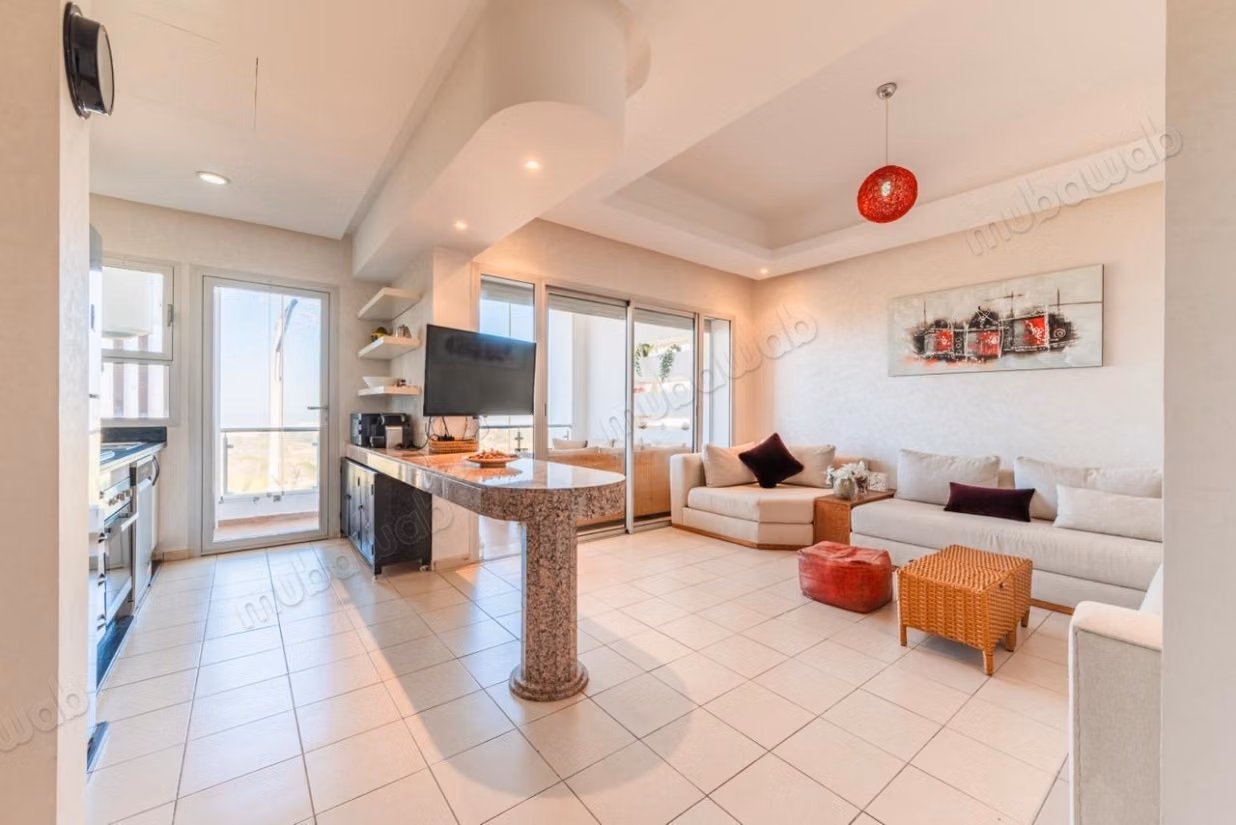 Appartement en location à Plage Oued Cherrat. 
Surface totale 90 m². 
Résidence avec piscine