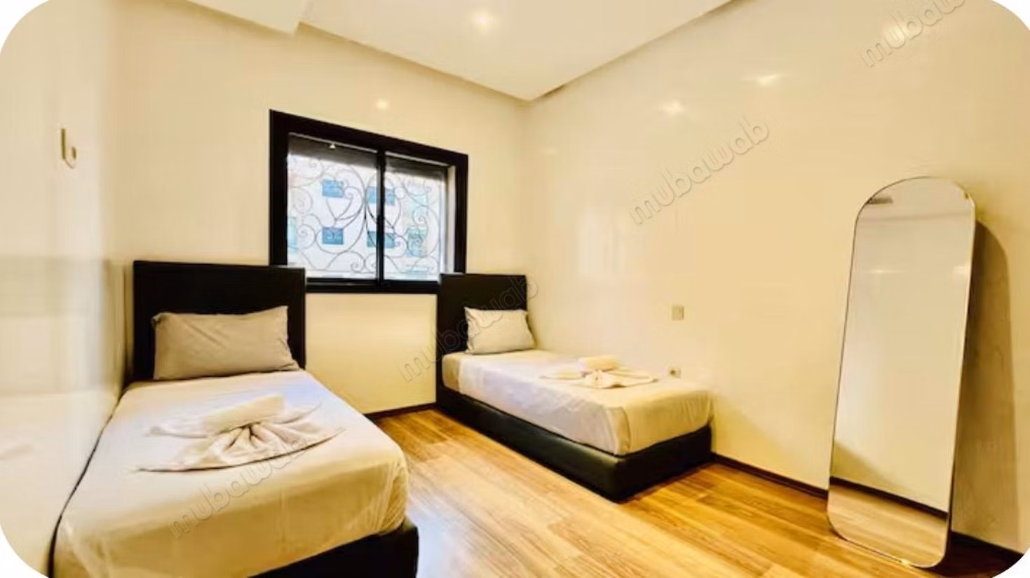 Seasonal rental in Ouasis. 2 beautiful bedrooms. Double glazing and armored door