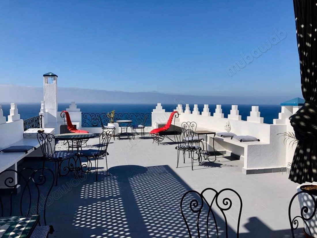 Maison traditionnelle avec vue sur la mer