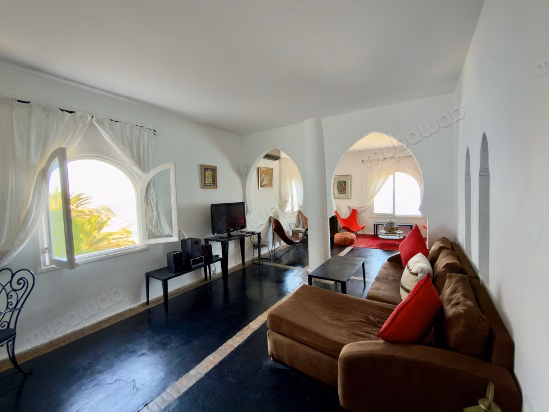 Maison traditionnelle avec vue sur la mer