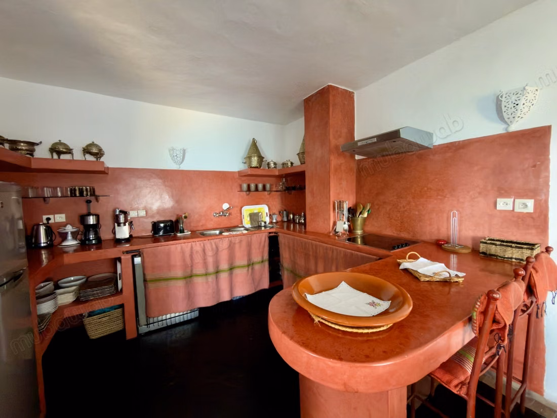 Maison traditionnelle avec vue sur la mer