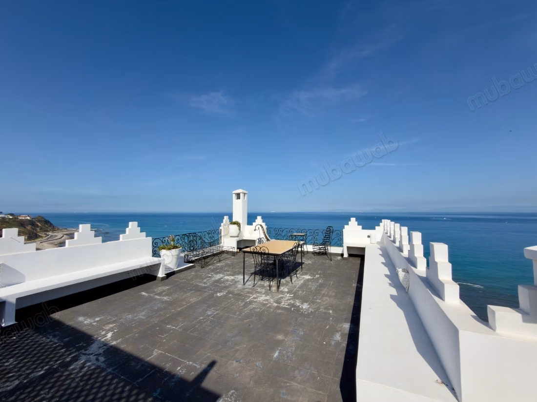 Maison traditionnelle avec vue sur la mer