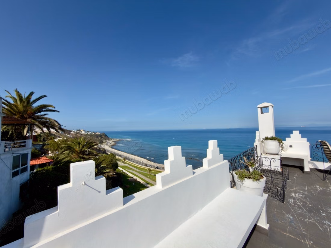Maison traditionnelle avec vue sur la mer