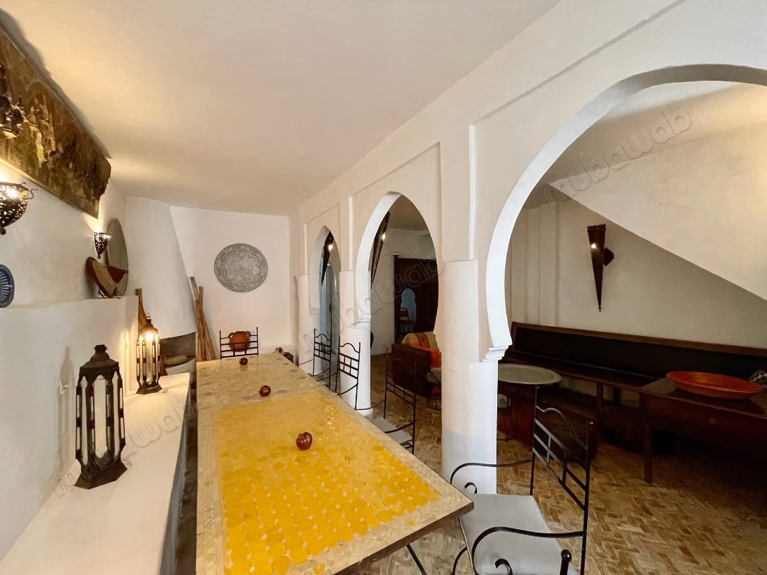 Maison traditionnelle avec vue sur la mer