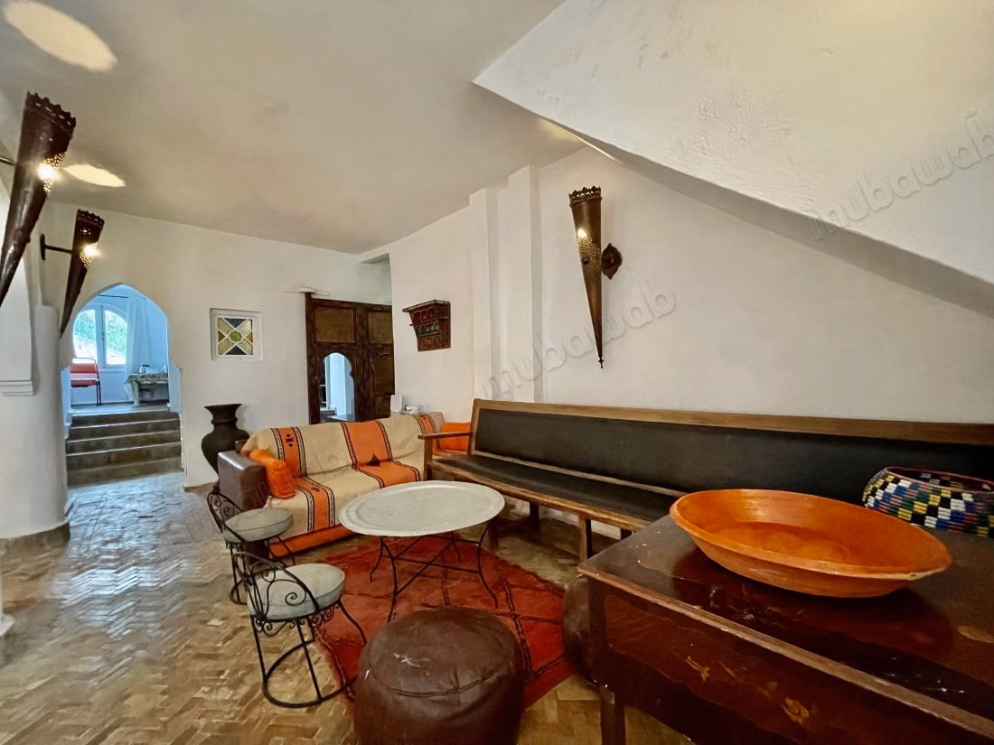 Maison traditionnelle avec vue sur la mer